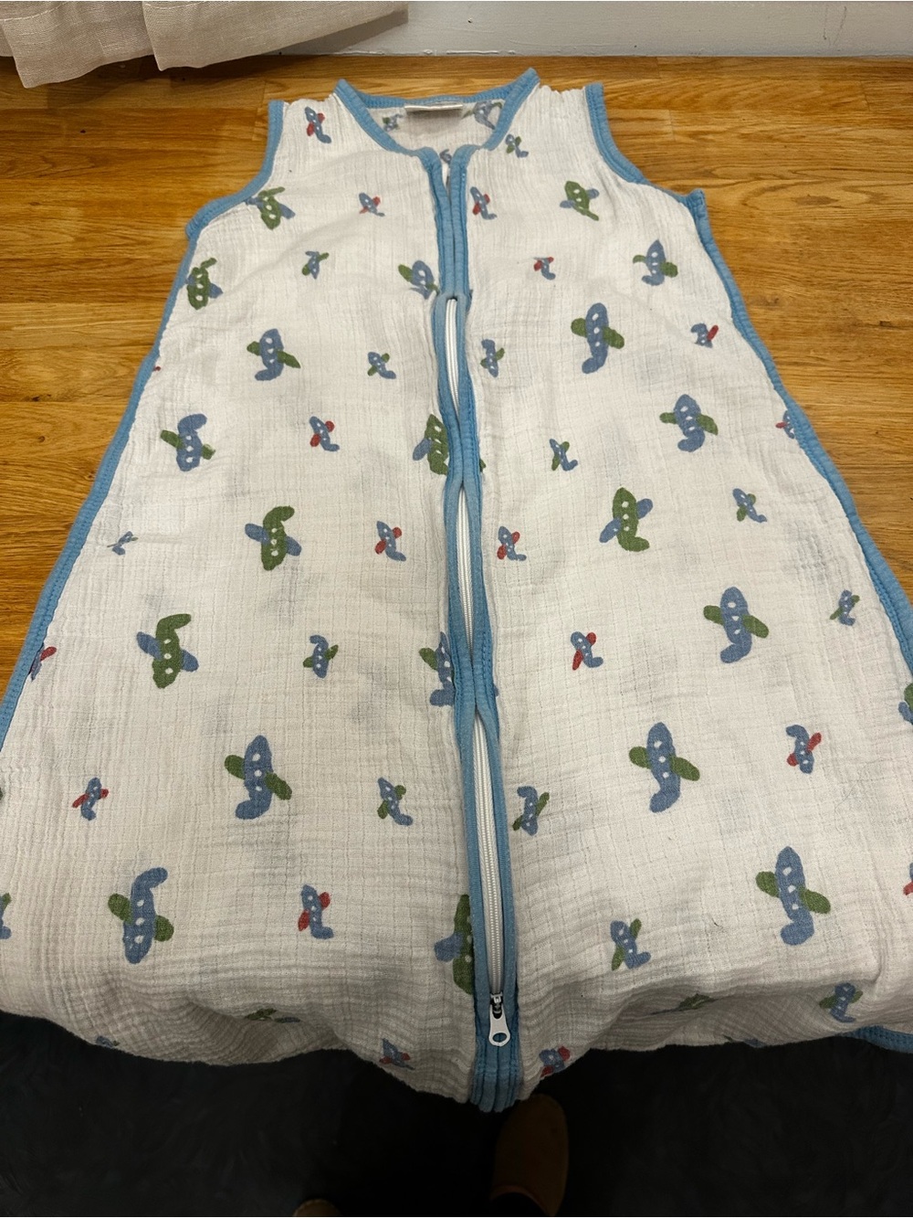 aden + anais White Muslin Sleep Sack with Blue Trim and Airplane Print